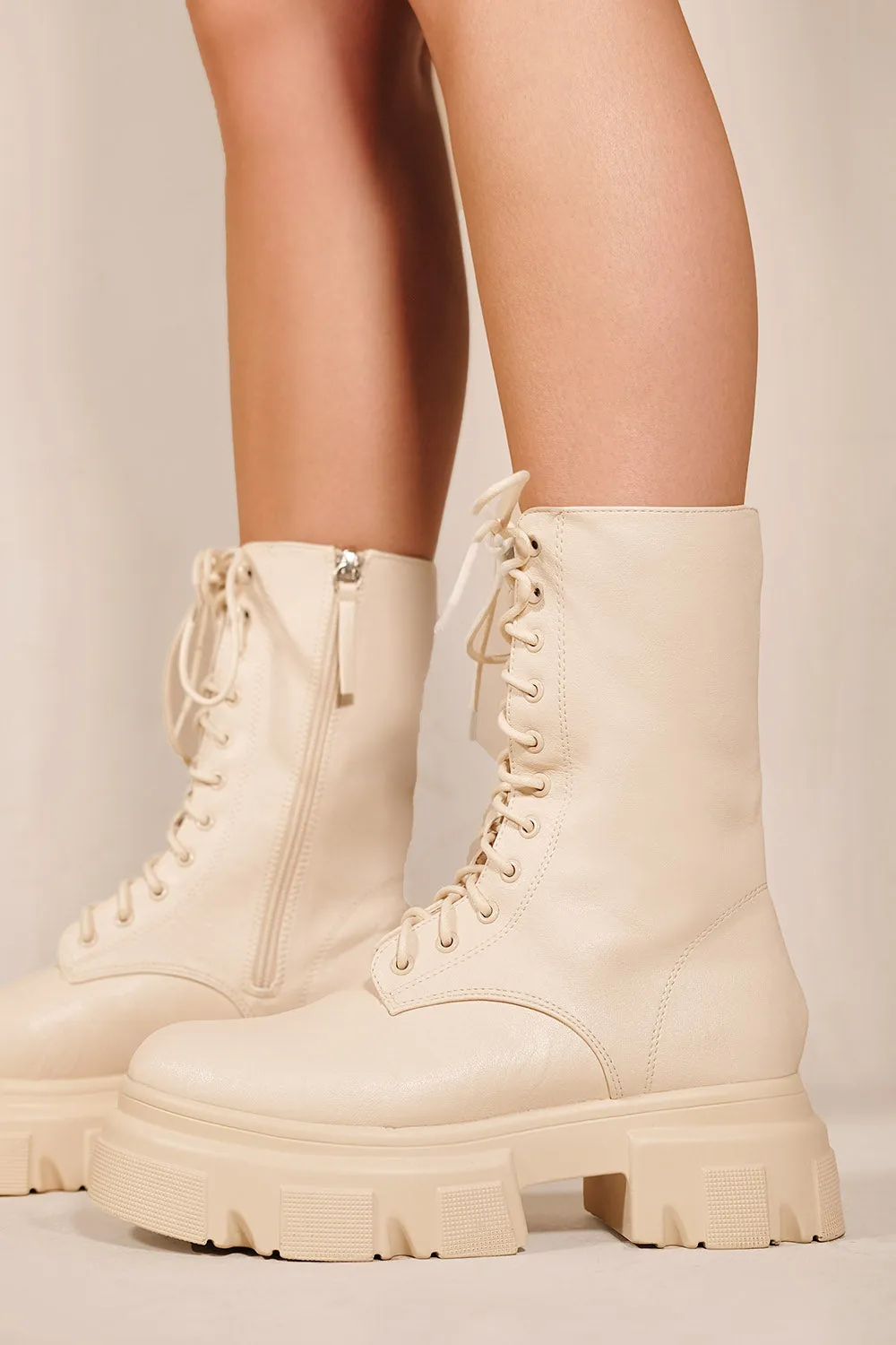 YARELEY CHUNKY SOLE ANKLE BOOTS WITH LACE UP DETAIL IN IVORY CREAM FAUX LEATHER